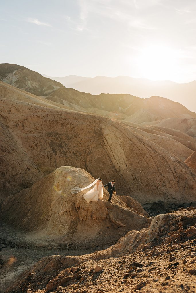 A couple walks around in Death valley national park.
